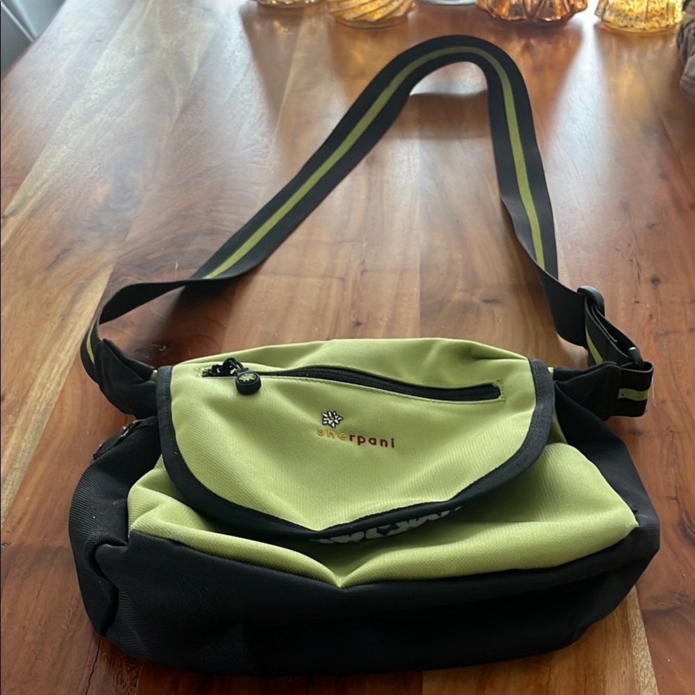 Sherpani Lime Green Crossbody Bag with magnetic snap closure and floral interior